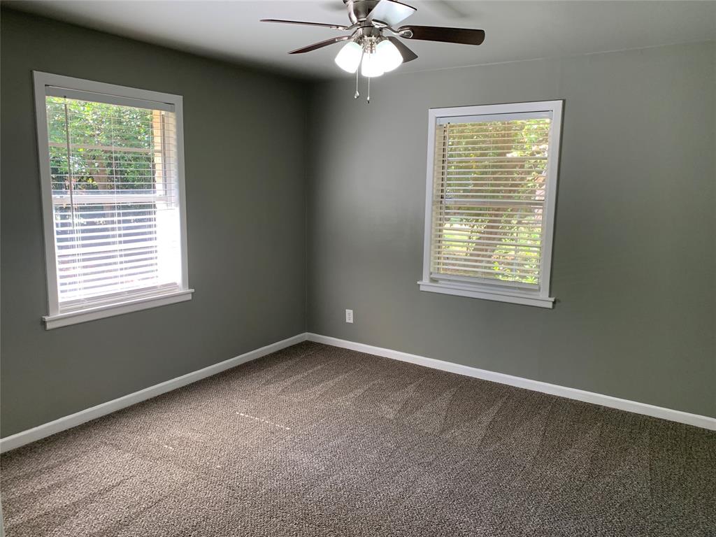 721 Barbara Street Athens, TX 75751 - Photo 12 of 18 a view of an empty room with a window