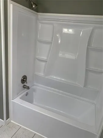 a bathroom with a bathtub