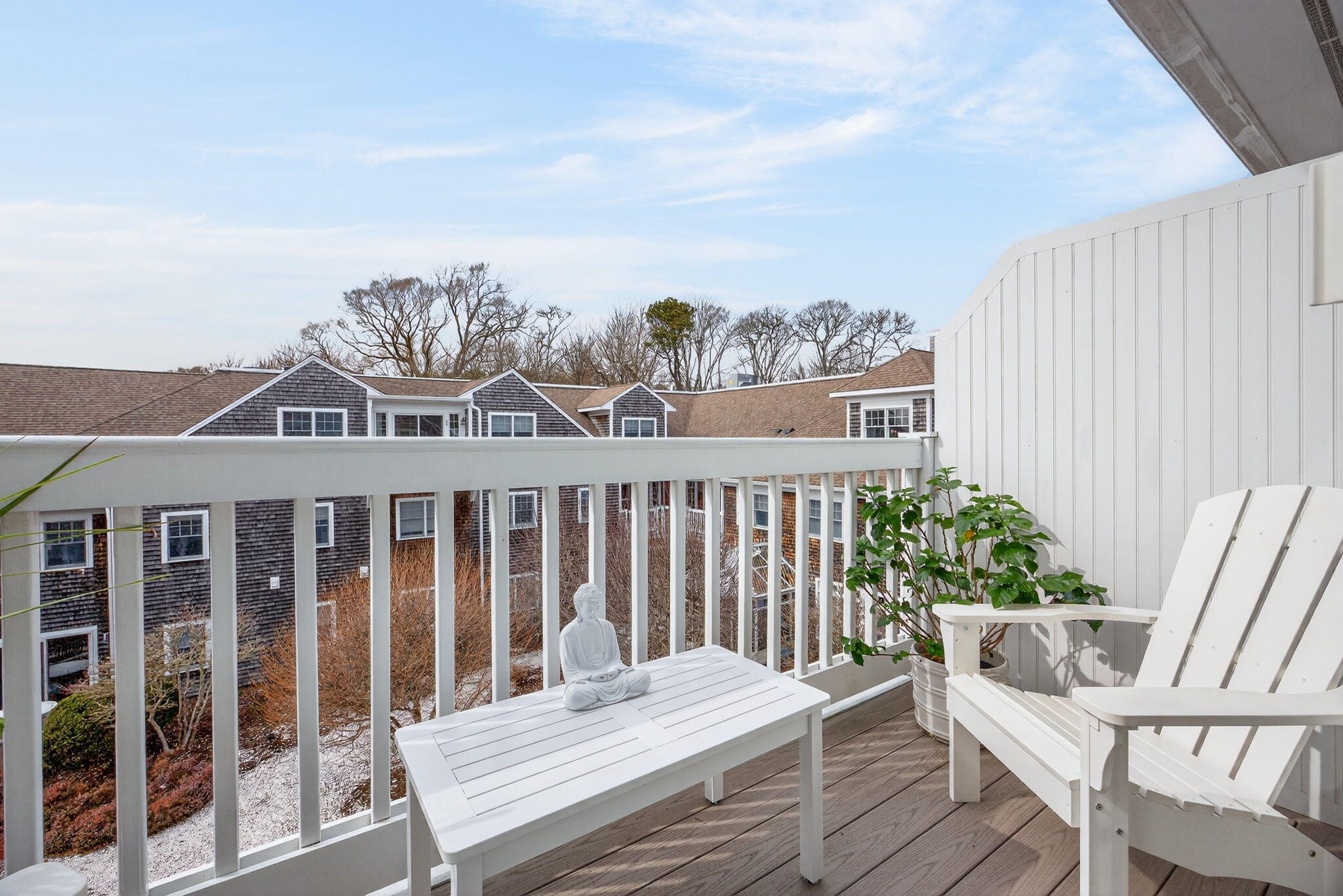 912 Main Street, Unit 308 Chatham, MA 02633 - Photo 12 of 65 a view of a deck with furniture