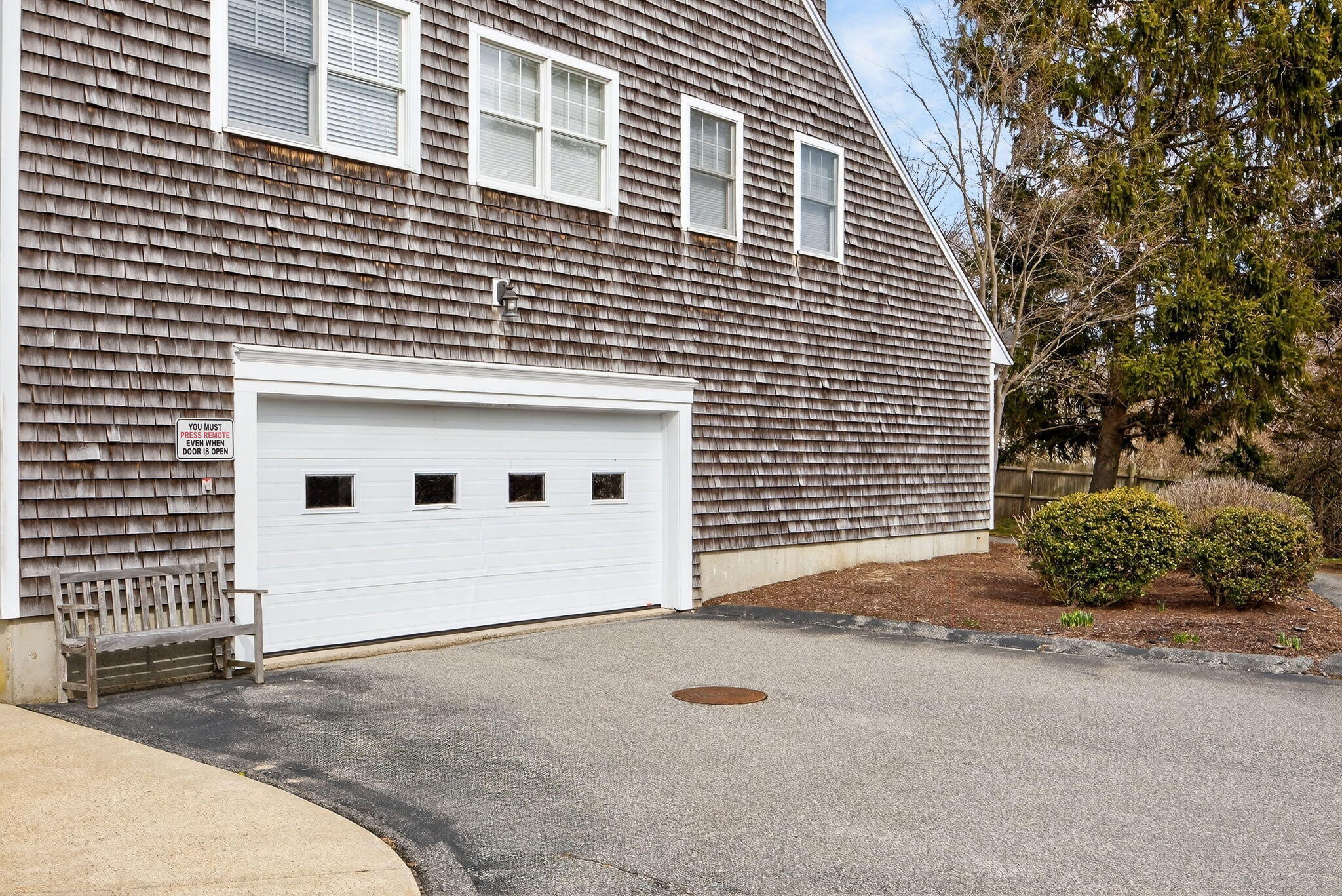 912 Main Street, Unit 308 Chatham, MA 02633 - Photo 59 of 65 a view of a house with a garage