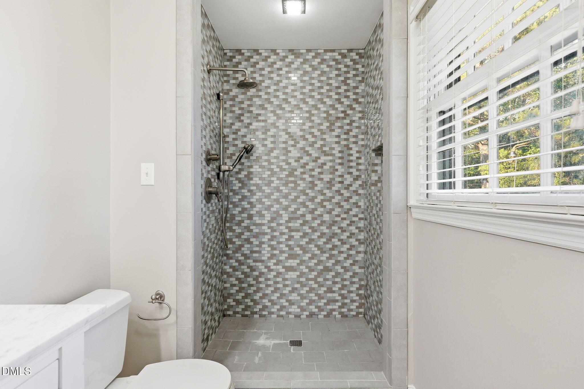 1130 Prospect Church Road Dunn, NC 28334 - Photo 34 of 47 a bathroom with a toilet and a shower curtain