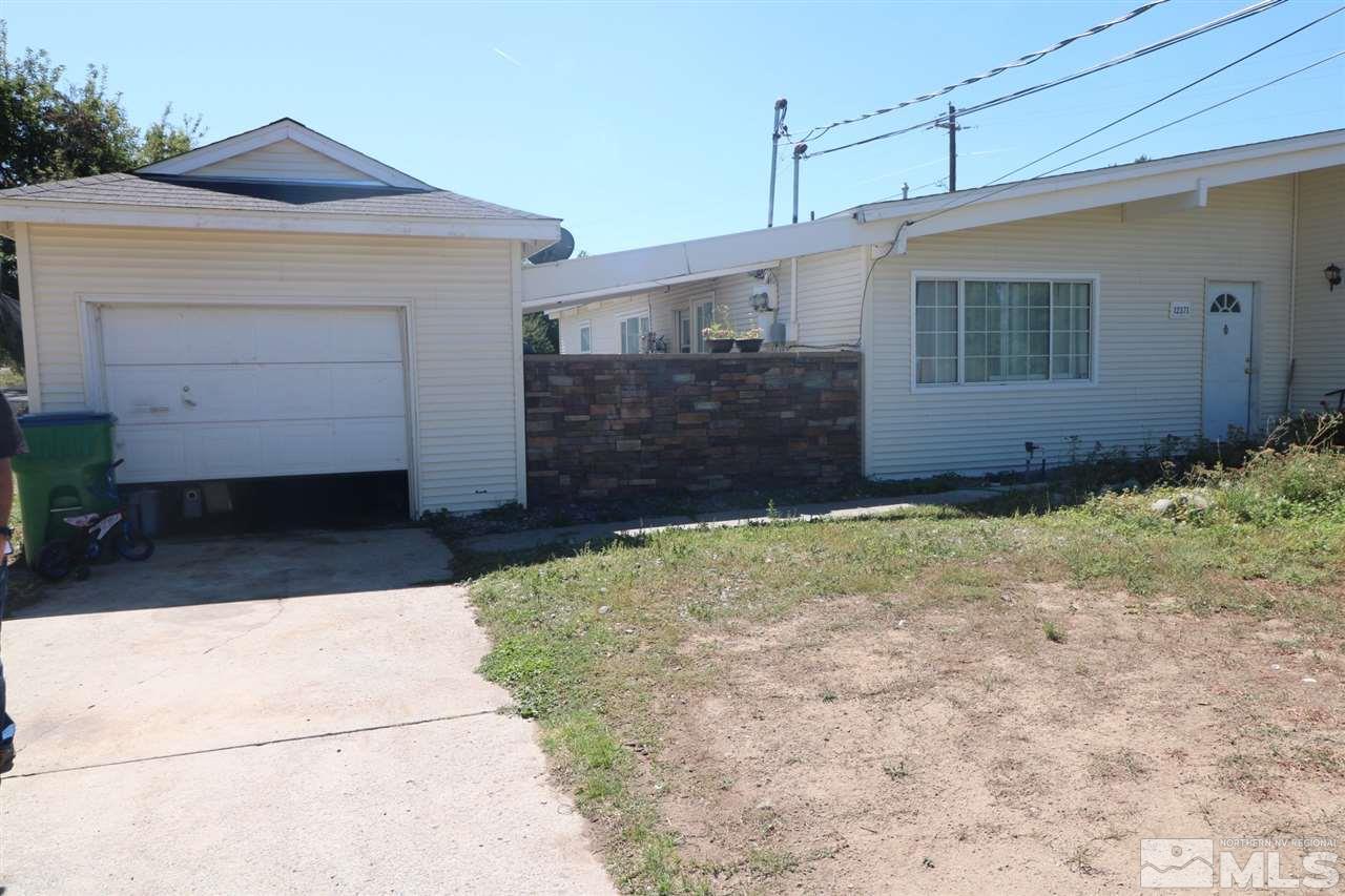 12371 Rocky Mountain Street Reno, NV 89506 - Photo 1 of 1 a front view of a house