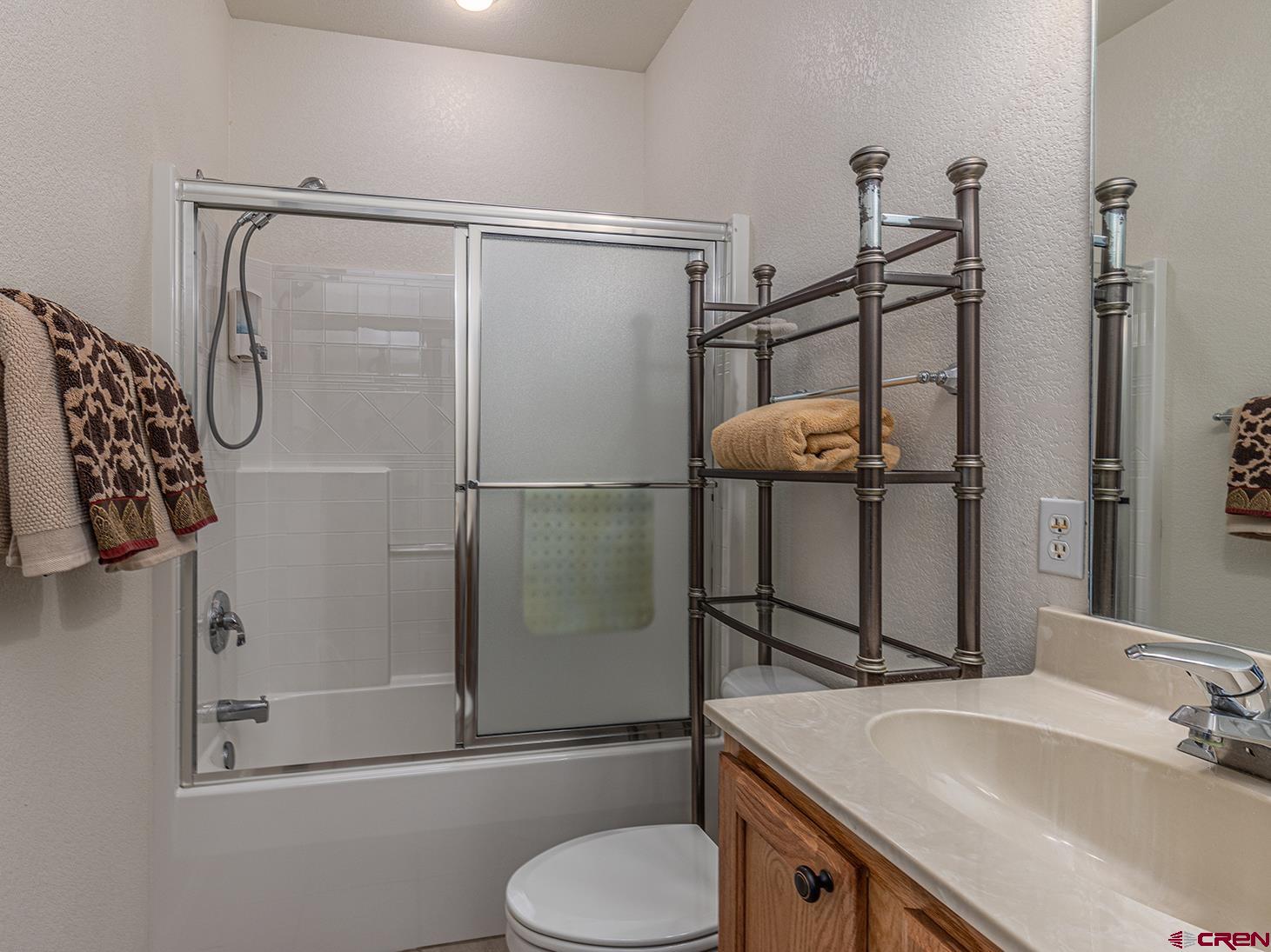 343 Jenkins Ranch Road Durango, CO 81301 - Photo 20 of 35 a bathroom with a sink toilet and shower
