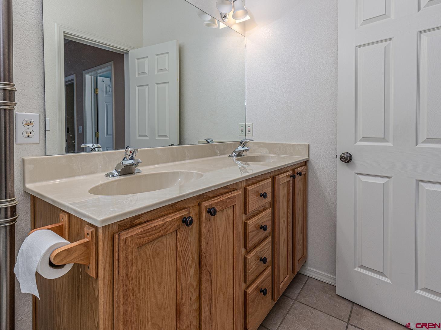 343 Jenkins Ranch Road Durango, CO 81301 - Photo 21 of 35 a bathroom with a sink and a mirror