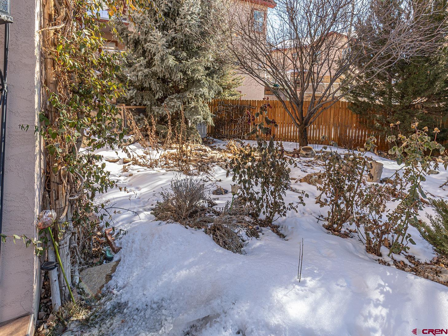 343 Jenkins Ranch Road Durango, CO 81301 - Photo 29 of 35 a view of a yard with snow on the road