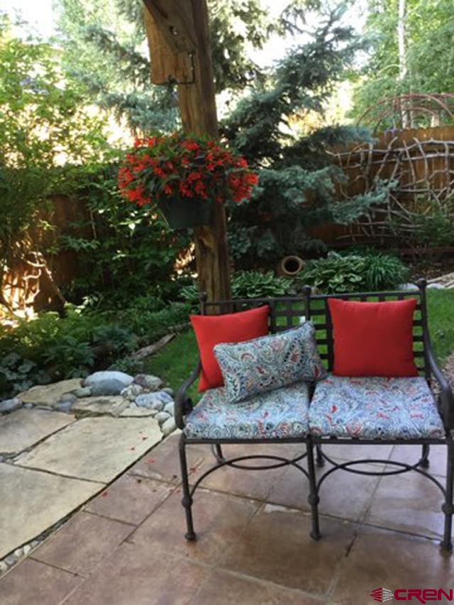 343 Jenkins Ranch Road Durango, CO 81301 - Photo 35 of 35 a outdoor sitting area with furniture and a tree