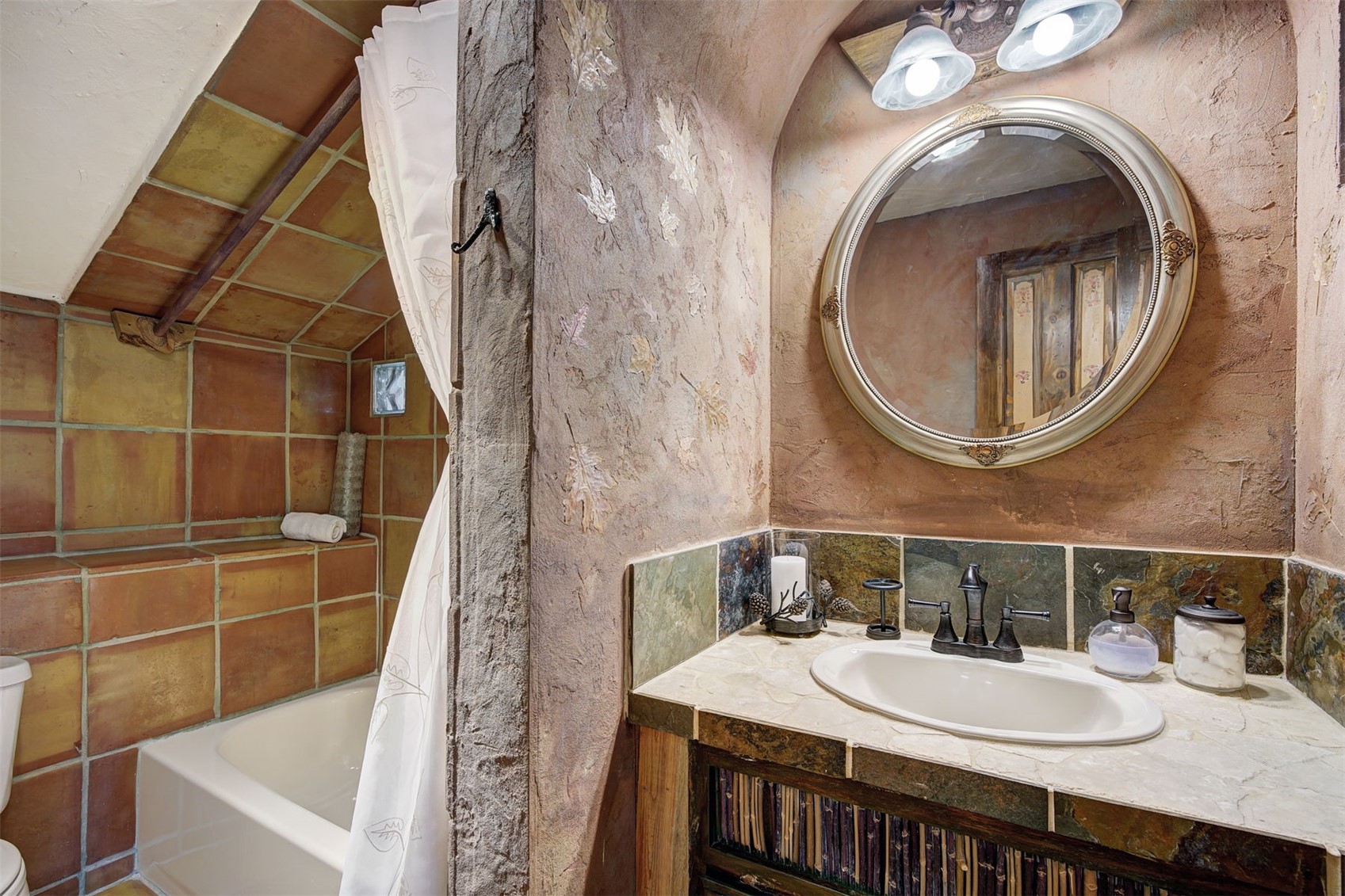 9460 Ryan Gulch Road, Unit 9460 Silverthorne, CO 80498 - Photo 22 of 39 a bathroom with a sink and a mirror