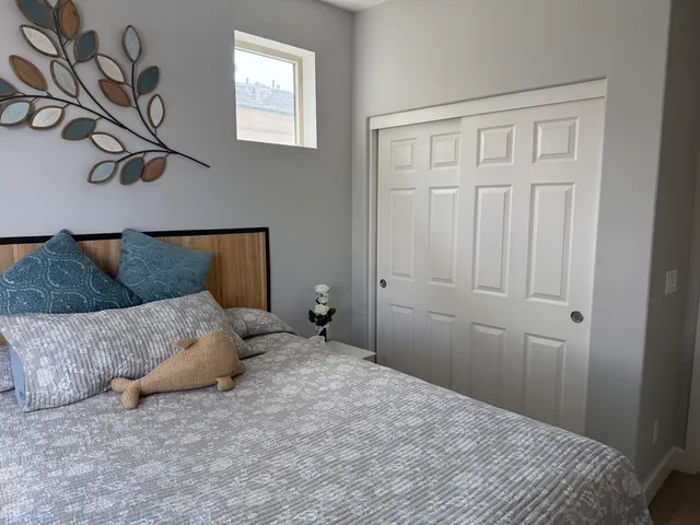 a bathroom with a shower curtain and a toilet