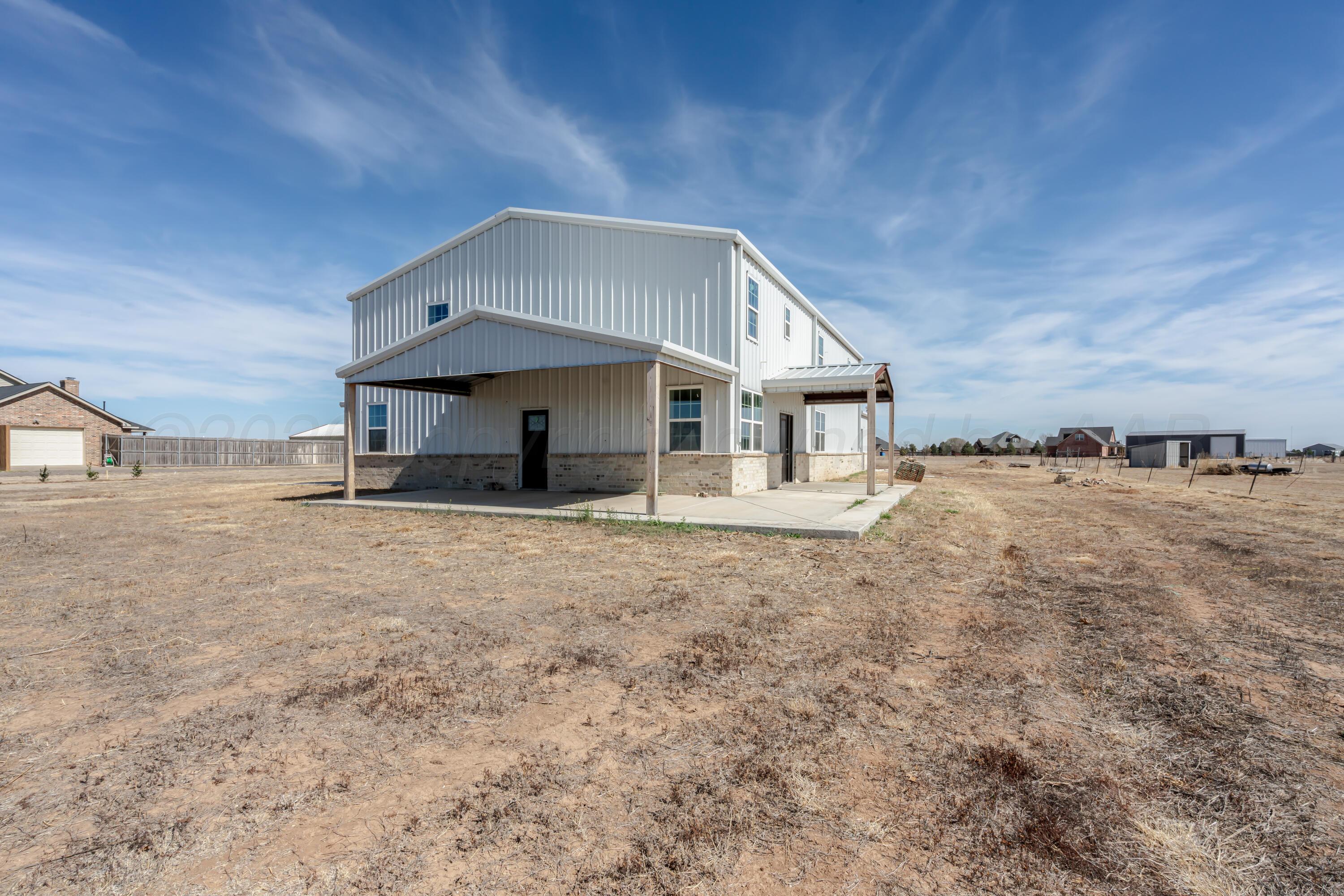 a house with trees in the background