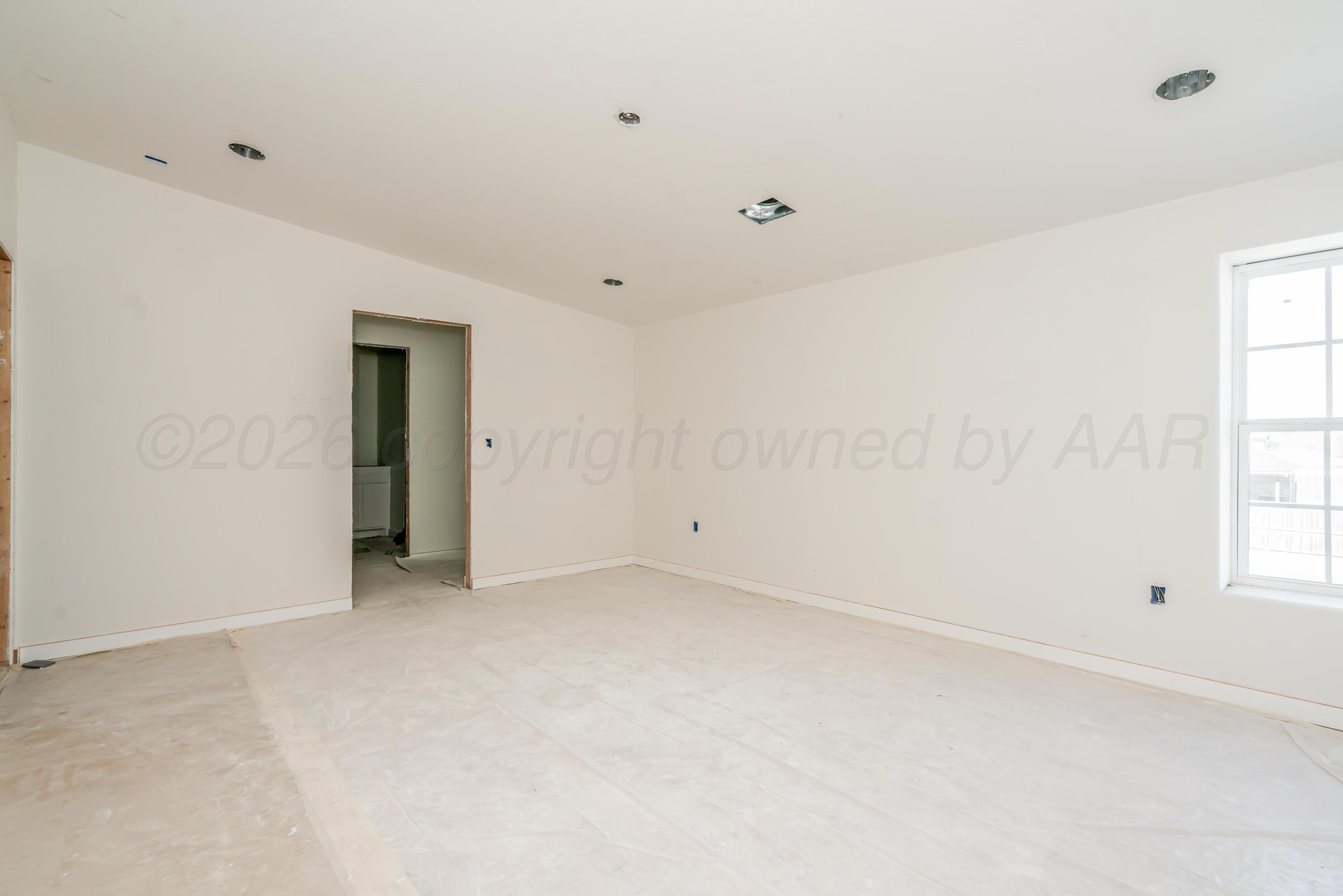 19900 Indian Spring Trail Amarillo, TX 79124 - Photo 20 of 33 wooden floor in an empty room
