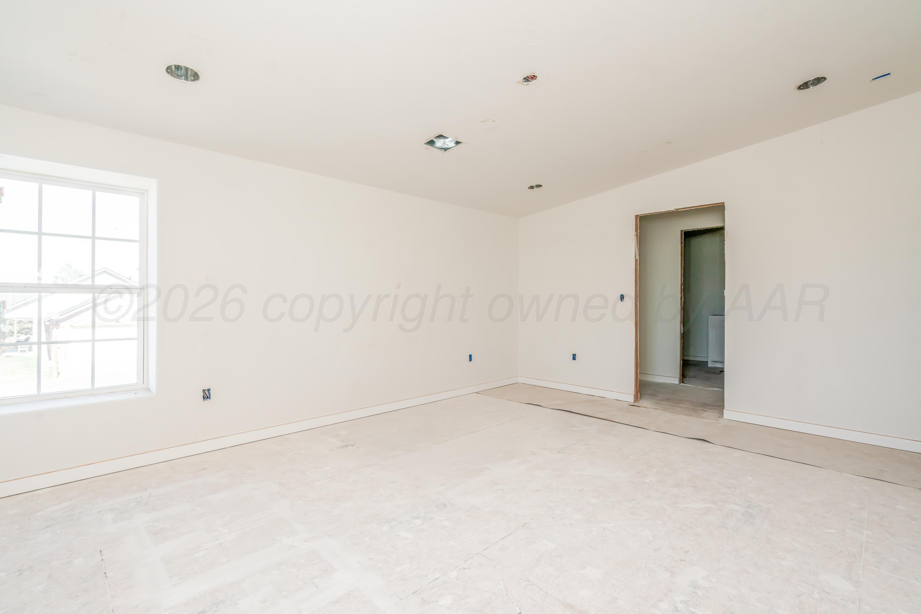 19900 Indian Spring Trail Amarillo, TX 79124 - Photo 23 of 33 an empty room with windows