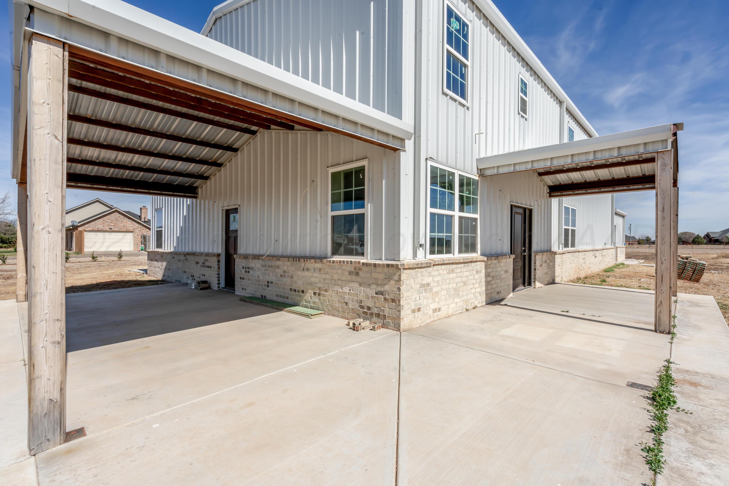19900 Indian Spring Trail Amarillo, TX 79124 - Photo 27 of 33 a front view of a house with a outdoor space
