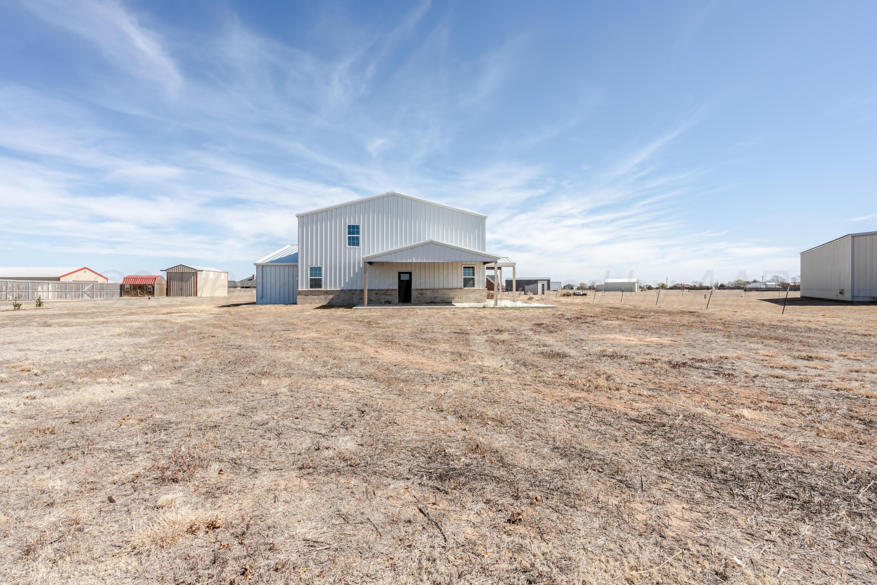 19900 Indian Spring Trail Amarillo, TX 79124 - Photo 28 of 33 a view of a kitchen with a sink and cabinets