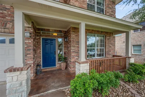 a front view of a house with a porch