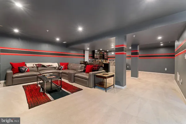 a room with furniture and a rug