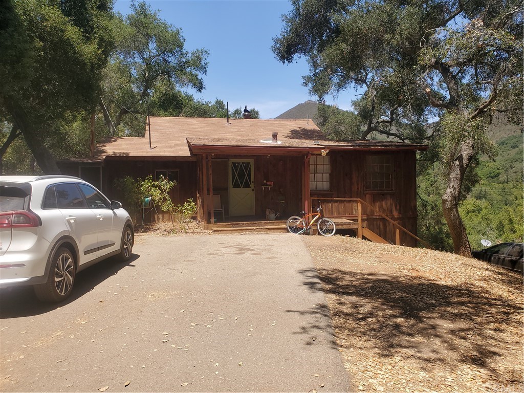 a house view with a outdoor space