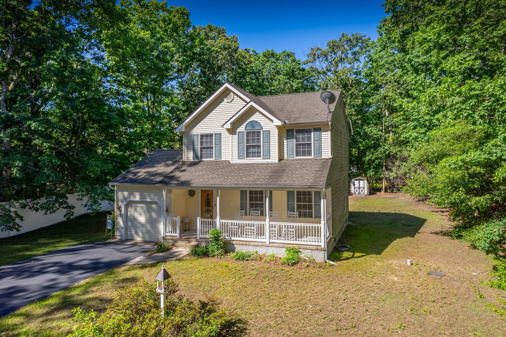 164 Clarks Pond Road Bridgeton, NJ 08302 - Photo 8 of 27 Charming home nestled in lush greenery.