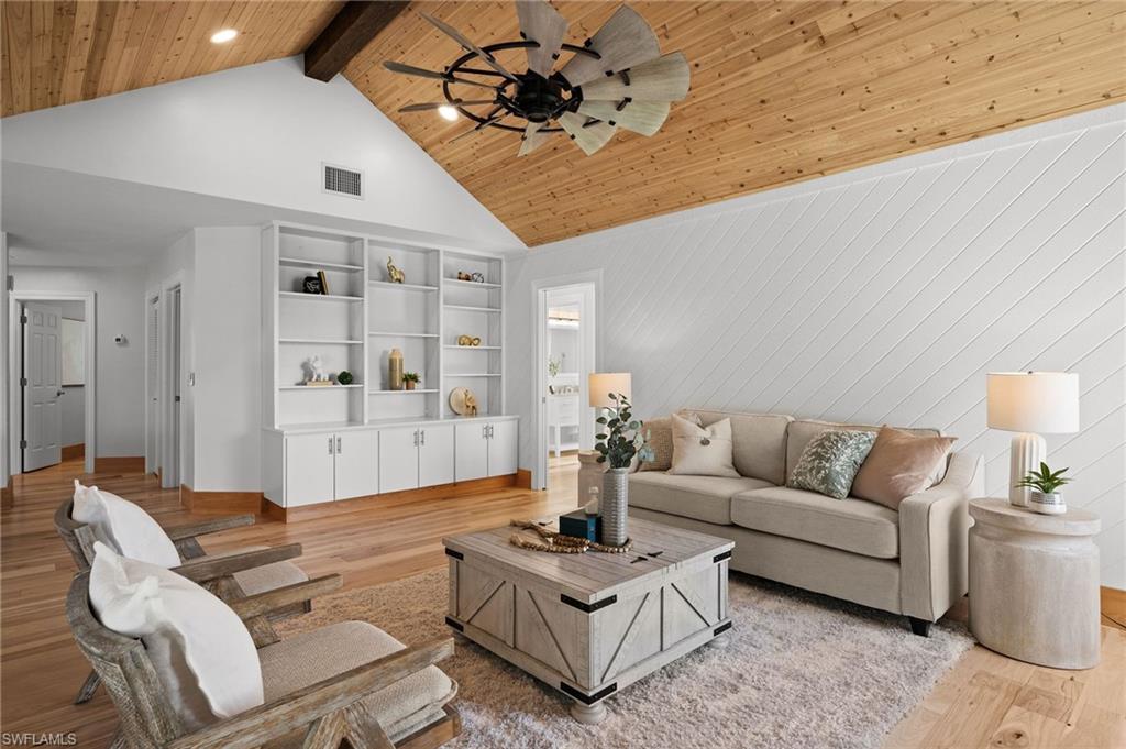 2012 Prince Drive Naples, FL 34110 - Photo 19 of 41 a living room with furniture and wooden floor