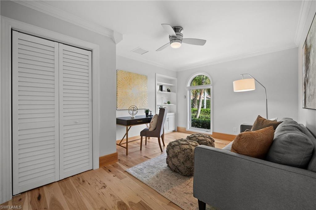 2012 Prince Drive Naples, FL 34110 - Photo 22 of 41 a living room with furniture and wooden floor