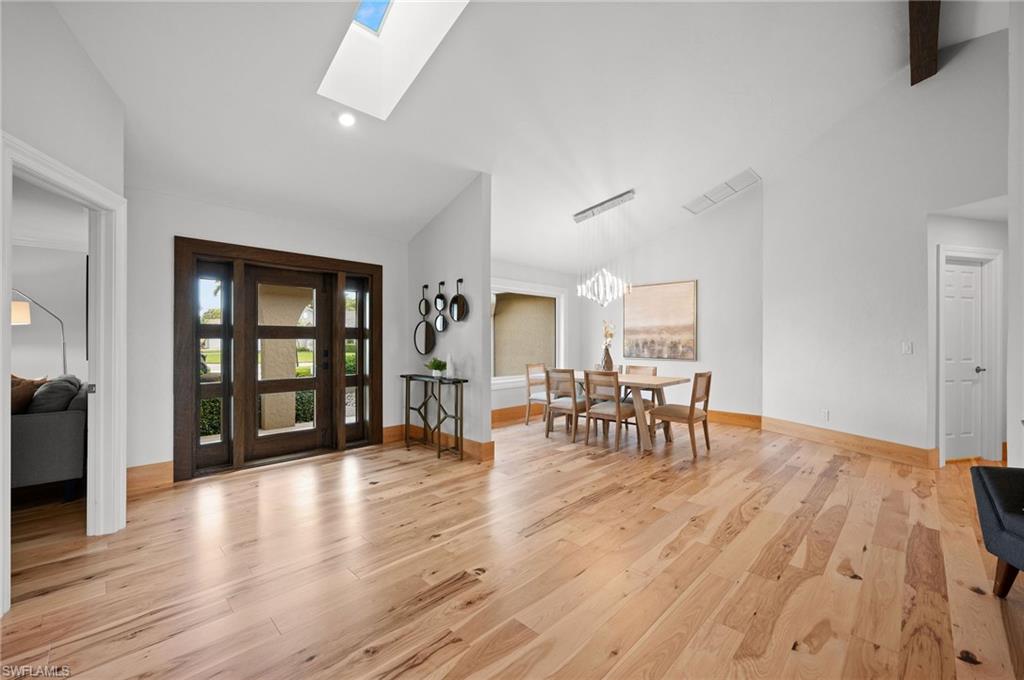 2012 Prince Drive Naples, FL 34110 - Photo 3 of 41 a view of dining room with furniture and wooden floor
