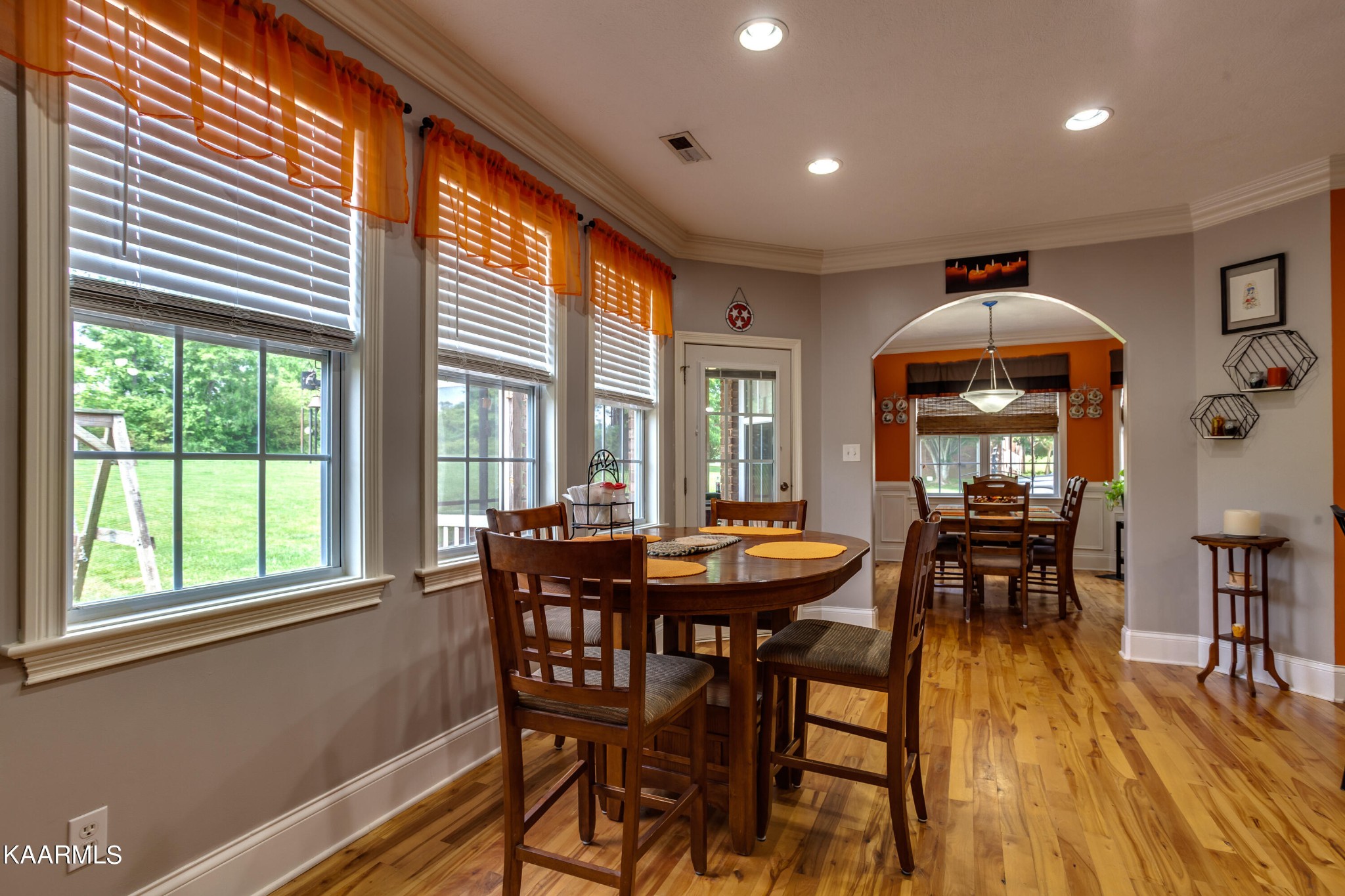 9601 Captain Smith Lane Corryton, TN 37721 - Photo 15 of 40 a dining room with furniture and wooden floor