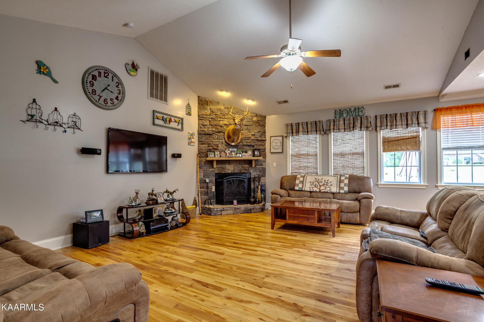 9601 Captain Smith Lane Corryton, TN 37721 - Photo 7 of 40 a living room with furniture and a fireplace