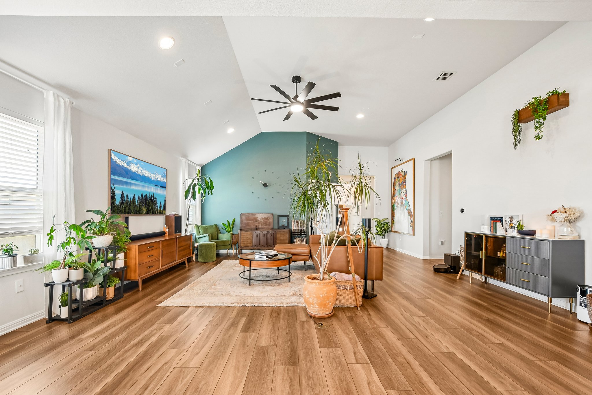 10700 Sentinel Drive Austin, TX 78747 - Photo 2 of 27 High ceilings, warm floors, and space that invites.