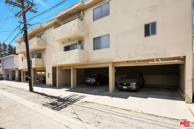 a building with a table and a fireplace