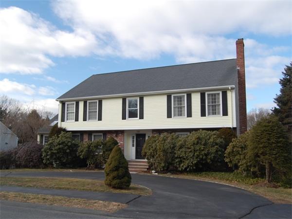 155 East Emerson Road Lexington, MA 02420 - Photo 2 of 18 a front view of a house with a yard
