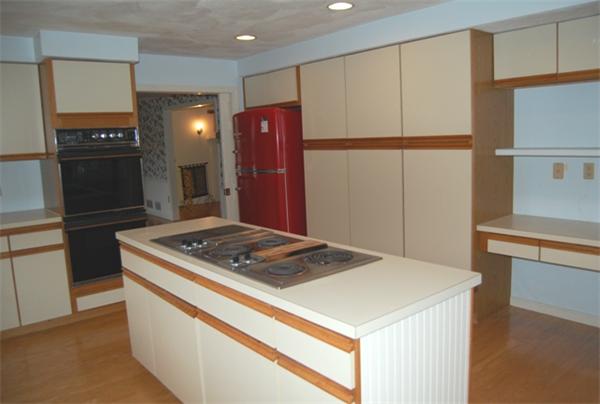 155 East Emerson Road Lexington, MA 02420 - Photo 9 of 18 a kitchen that has a sink a refrigerator and a stove