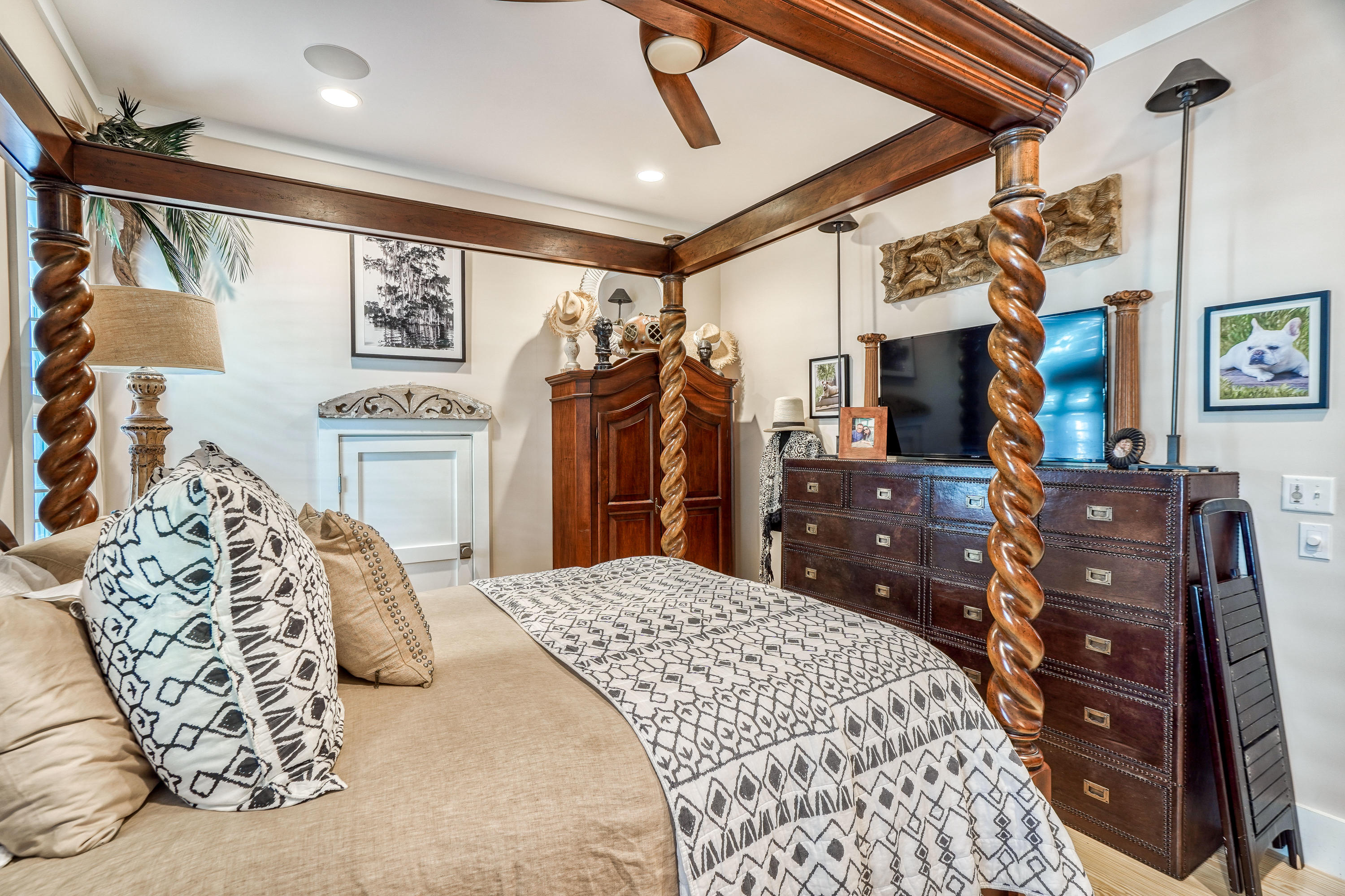 406 Defuniak Street Santa Rosa Beach, FL 32459 - Photo 24 of 87 a bed room with a bed and a television