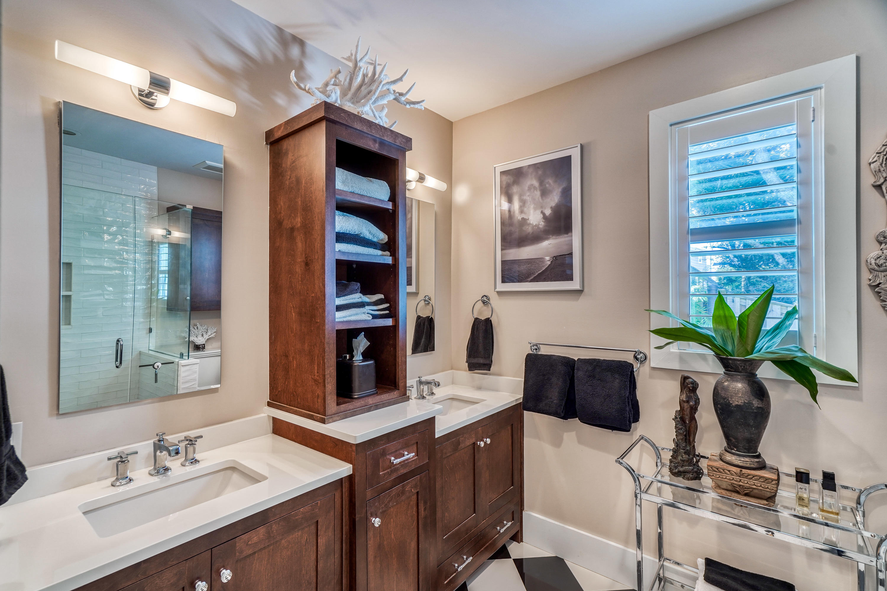 406 Defuniak Street Santa Rosa Beach, FL 32459 - Photo 30 of 87 a bathroom with a sink a vanity and a mirror