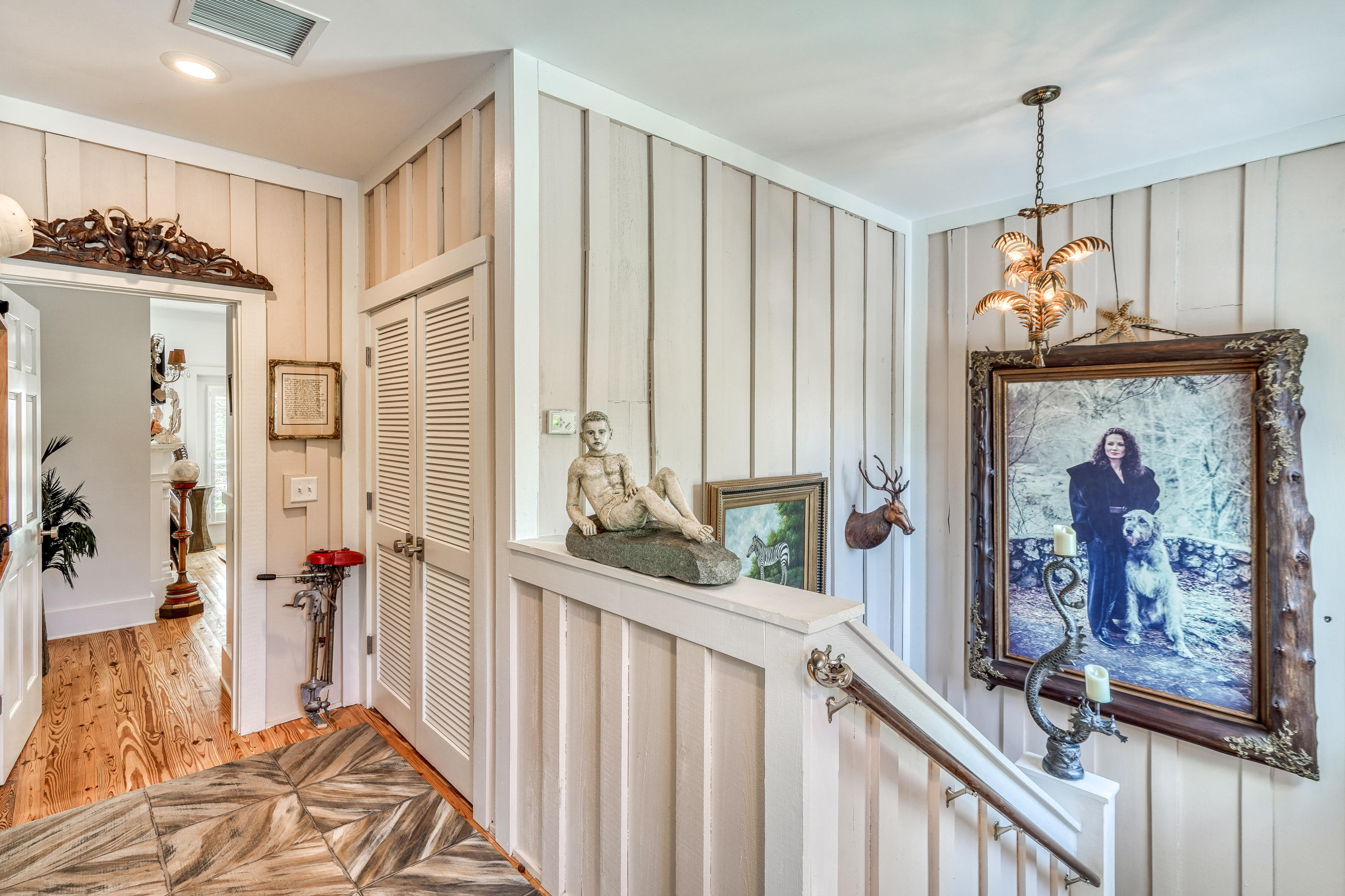 406 Defuniak Street Santa Rosa Beach, FL 32459 - Photo 35 of 87 a view of a hallway with furniture and front door