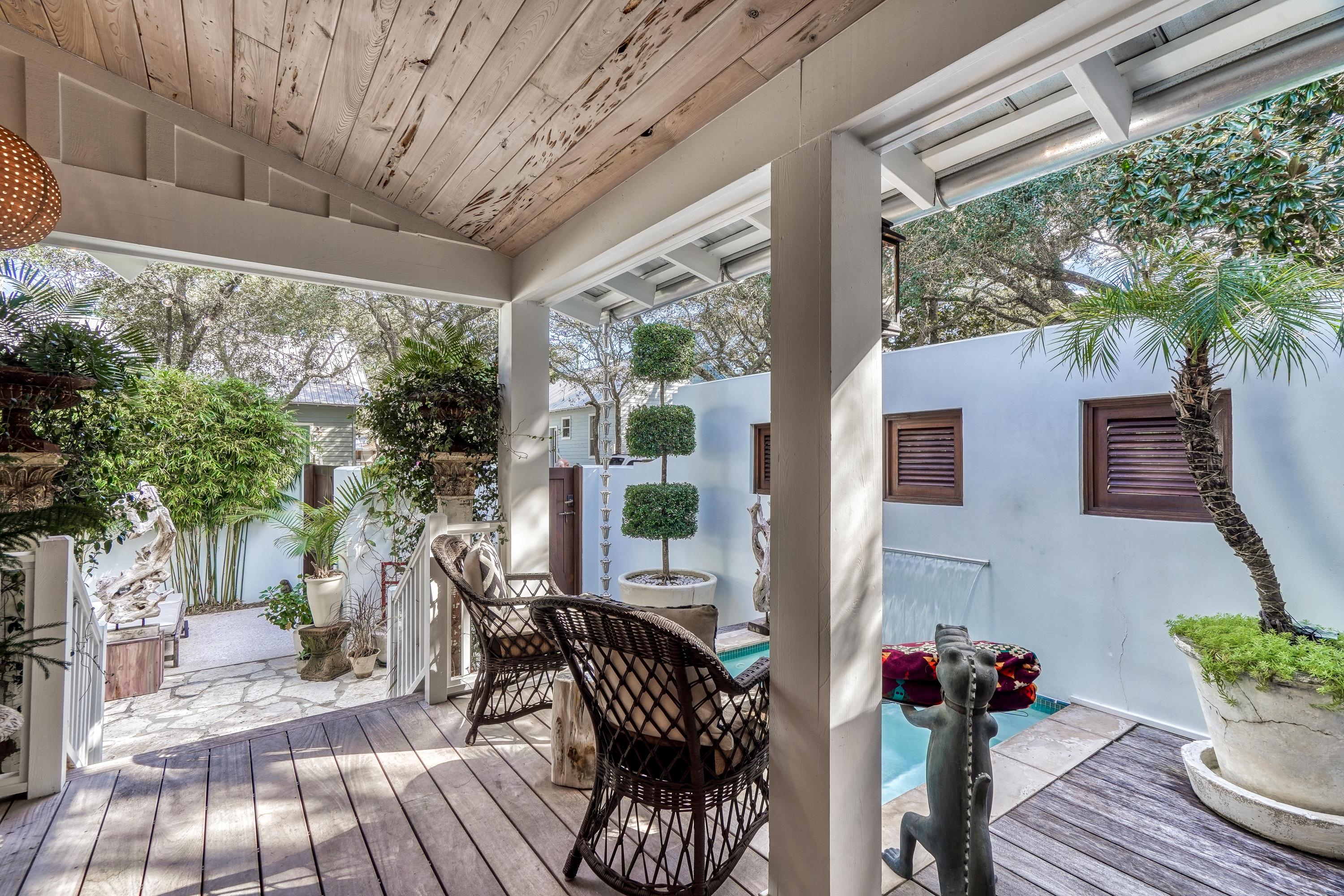 406 Defuniak Street Santa Rosa Beach, FL 32459 - Photo 65 of 87 a view of balcony with furniture and garden view