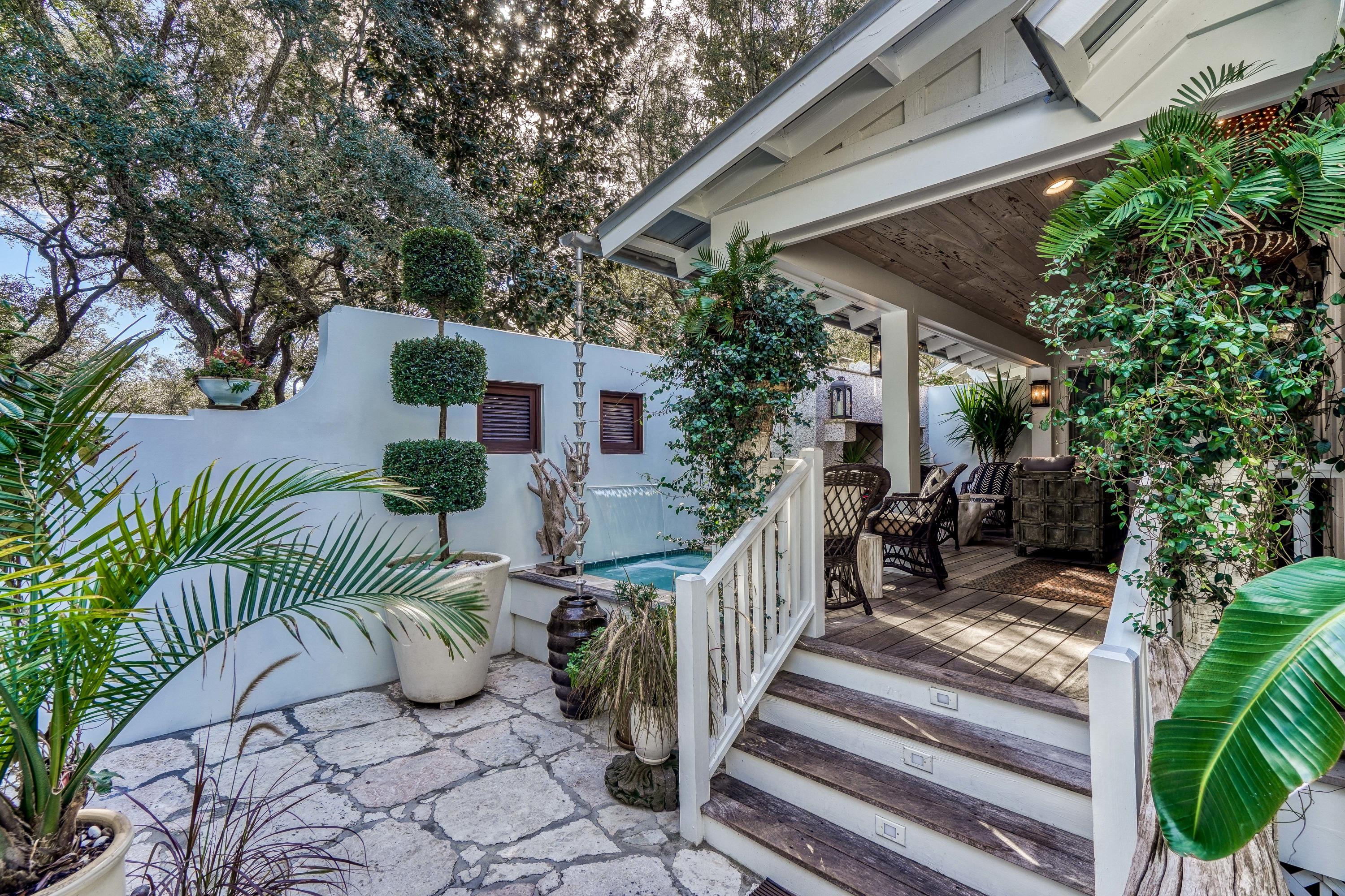 406 Defuniak Street Santa Rosa Beach, FL 32459 - Photo 72 of 87 a view of a chairs and tables in the patio