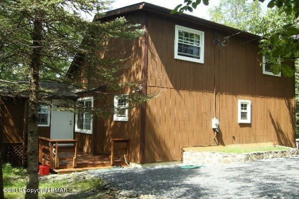 745 Hampstead Road Bushkill, PA 18324 - Photo 1 of 10 a front view of a house