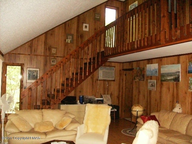 745 Hampstead Road Bushkill, PA 18324 - Photo 7 of 10 a view of a couches with the view of the house