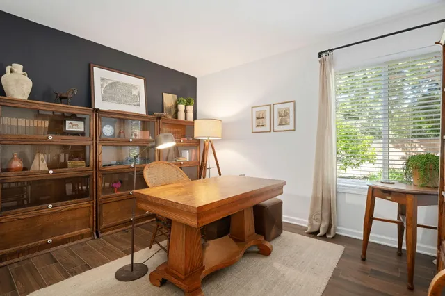 a bathroom with a sink vanity and mirror