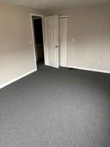 an empty room that has a window