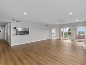 1302 Marina Bay Drive, Unit 201A Kemah, TX 77565 - Photo 15 of 43 a view of a kitchen with a sink and a large window