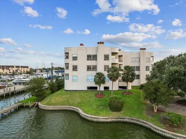 a view of a lake with a building in the background