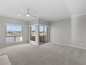 1302 Marina Bay Drive, Unit 201A Kemah, TX 77565 - Photo 33 of 43 a view of an empty room with window and cabinet
