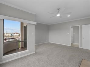 1302 Marina Bay Drive, Unit 201A Kemah, TX 77565 - Photo 35 of 43 an empty room with a kitchen and a fireplace