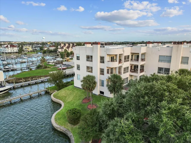 aerial view of a house with a yard