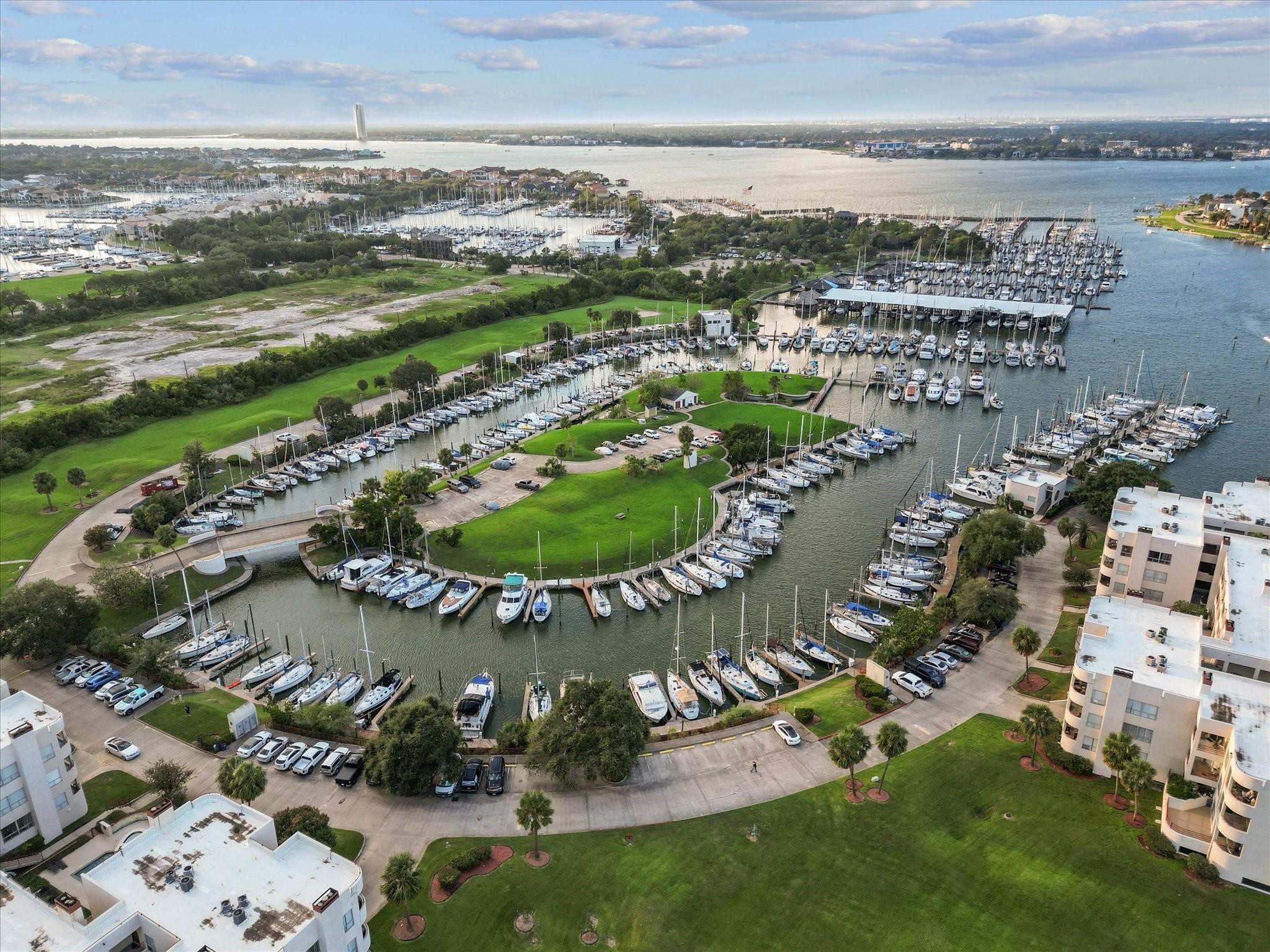 1302 Marina Bay Drive, Unit 201A Kemah, TX 77565 - Photo 7 of 43 an aerial view of residential houses with outdoor space