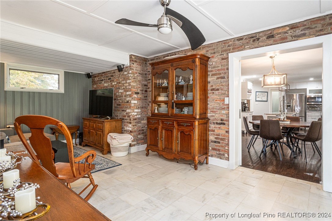 2539 Huntington Road Fayetteville, NC 28303 - Photo 11 of 39 a view of a livingroom with furniture and windows