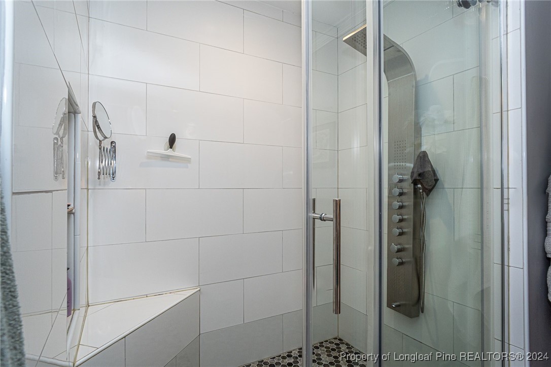 2539 Huntington Road Fayetteville, NC 28303 - Photo 23 of 39 a bathroom with a shower