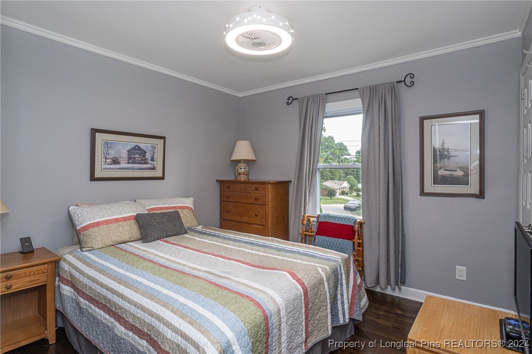 2539 Huntington Road Fayetteville, NC 28303 - Photo 26 of 39 a bedroom with a bed and a window
