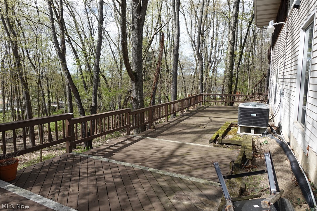 15488 Hatfield Road Rittman, OH 44270 - Photo 32 of 36 Wooden deck with central AC unit