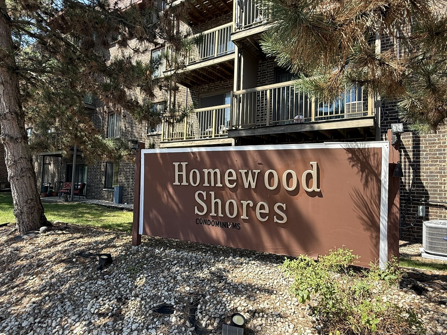 830 Elder Road, Unit 111 Homewood, IL 60430 - Photo 15 of 15 a view of outdoor space with sign board